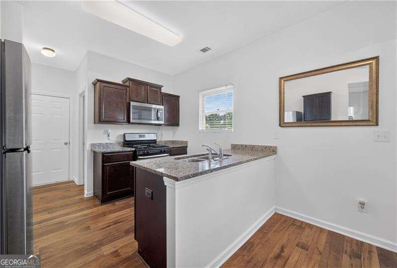 4 bedroom, 2.5 bathroom, 1,596 sq ft single family residence for sale at 707 Nonsuch Court, Winder, GA 30680 — photo 9