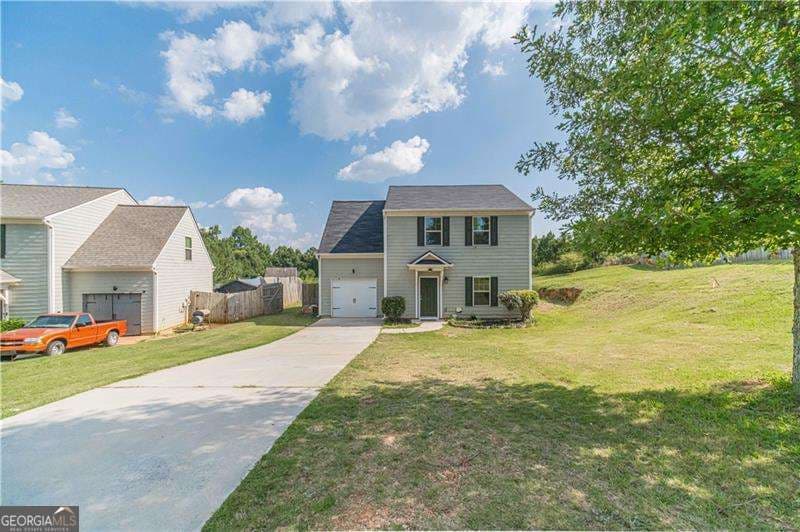 4 bedroom, 2.5 bathroom, 1,596 sq ft single family residence for sale at 707 Nonsuch Court, Winder, GA 30680 — photo 4