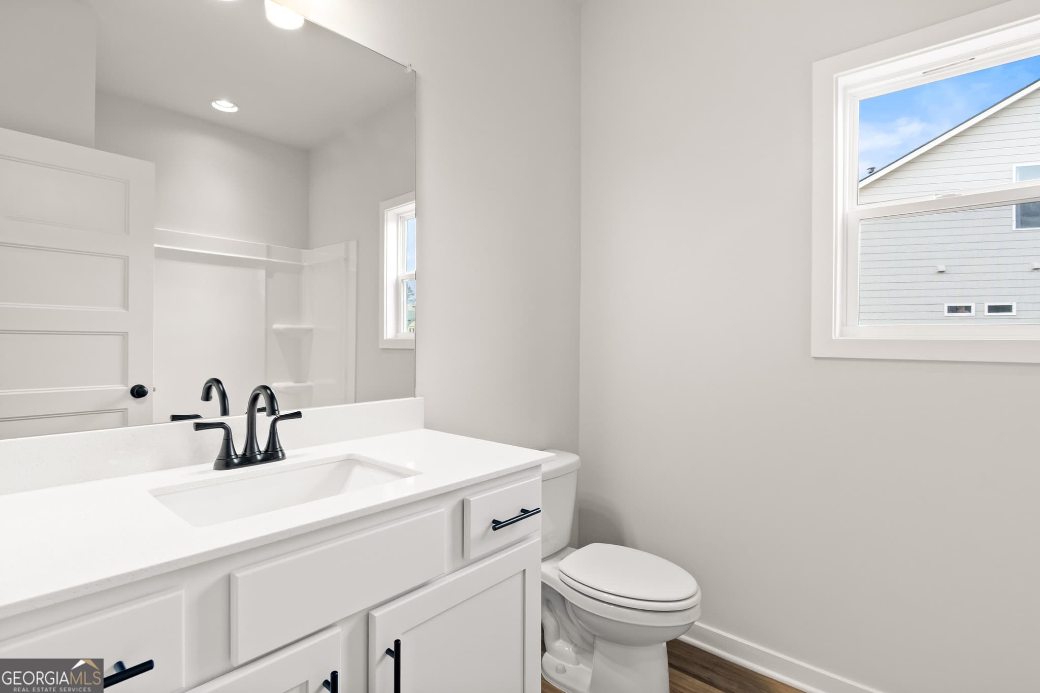 4 bedroom, 3.5 bathroom, 3,121 sq ft single family residence for sale at 279 Rosewood Park Drive, Hoschton, GA 30548 — photo 4