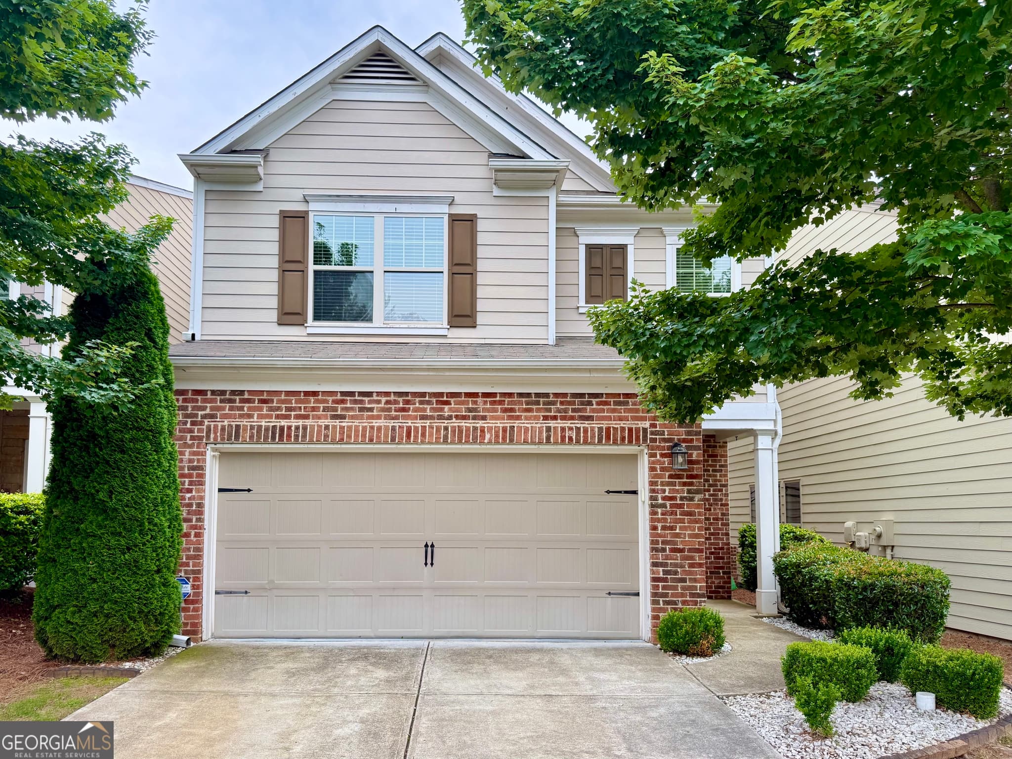 3 bedroom, 2.5 bathroom, 2,375 sq ft single family residence for sale at 5115 Breezewood Circle, Alpharetta, GA 30004
