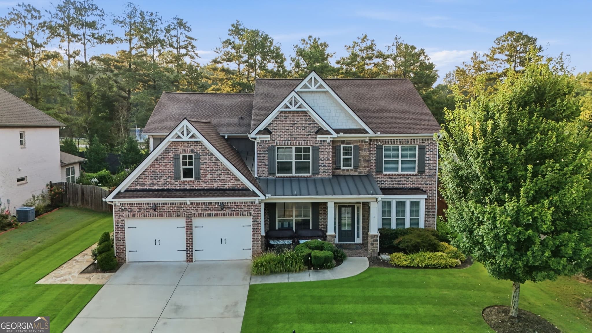 5 bedroom, 4 bathroom, 3,565 sq ft single family residence for sale at 4121 Secret Shoals Way, Buford, GA 30518 — photo 6