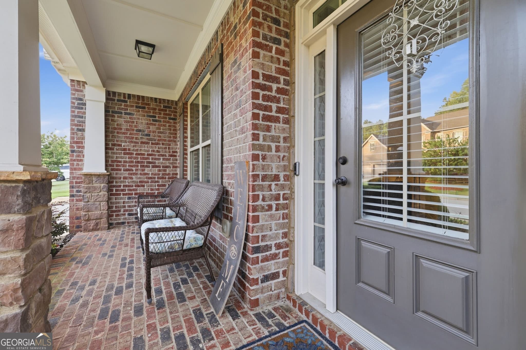 5 bedroom, 4 bathroom, 3,565 sq ft single family residence for sale at 4121 Secret Shoals Way, Buford, GA 30518 — photo 7