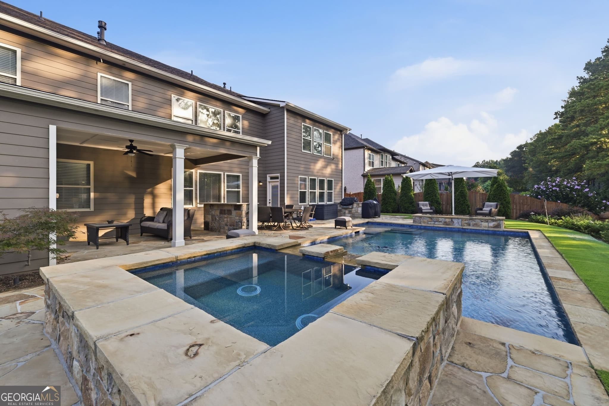 5 bedroom, 4 bathroom, 3,565 sq ft single family residence for sale at 4121 Secret Shoals Way, Buford, GA 30518 — photo 1 of 71