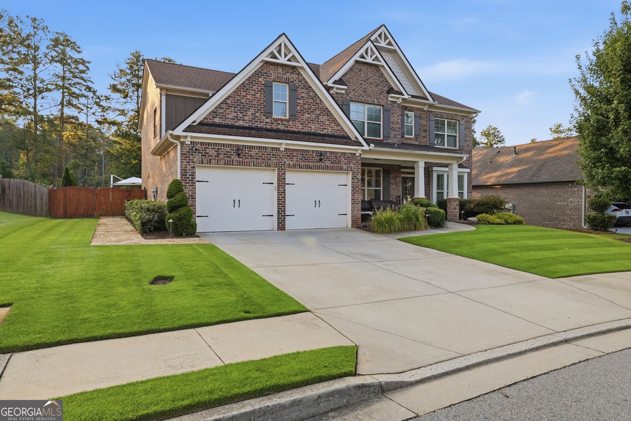 5 bedroom, 4 bathroom, 3,565 sq ft single family residence for sale at 4121 Secret Shoals Way, Buford, GA 30518 — photo 4