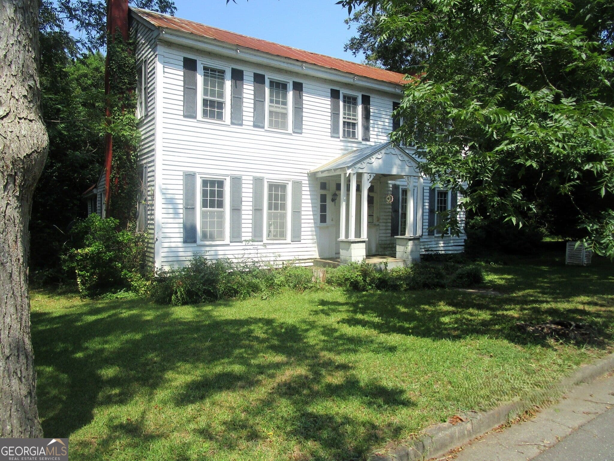 3 bedroom, 1 bathroom, 2,128 sq ft single family residence for sale at 135 Jennings Street, Crawfordville, GA 30631 — photo 1 of 10
