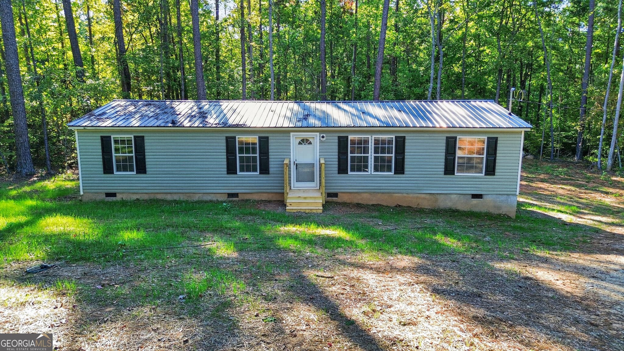 4 bedroom, 2 bathroom, 1,296 sq ft manufactured home,single family residence for sale at 101 W Bearcreek Road, Eatonton, GA 31024