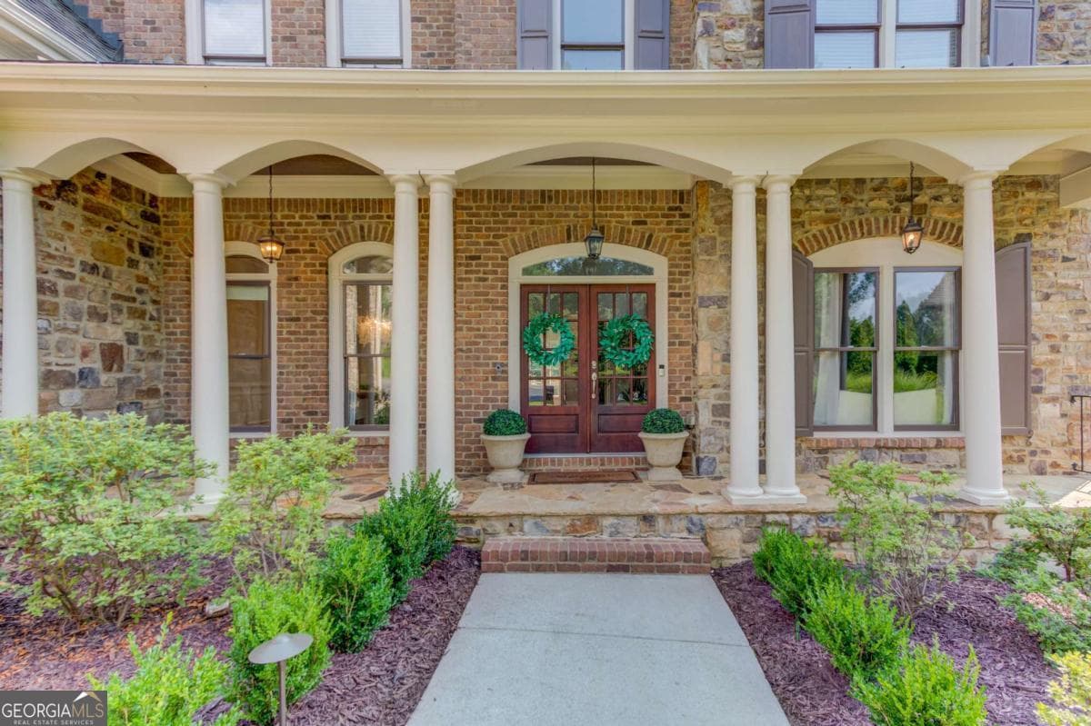 6 bedroom, 6.5 bathroom, 7,123 sq ft single family residence for sale at 5318 Binghurst Court, Suwanee, GA 30024 — photo 7