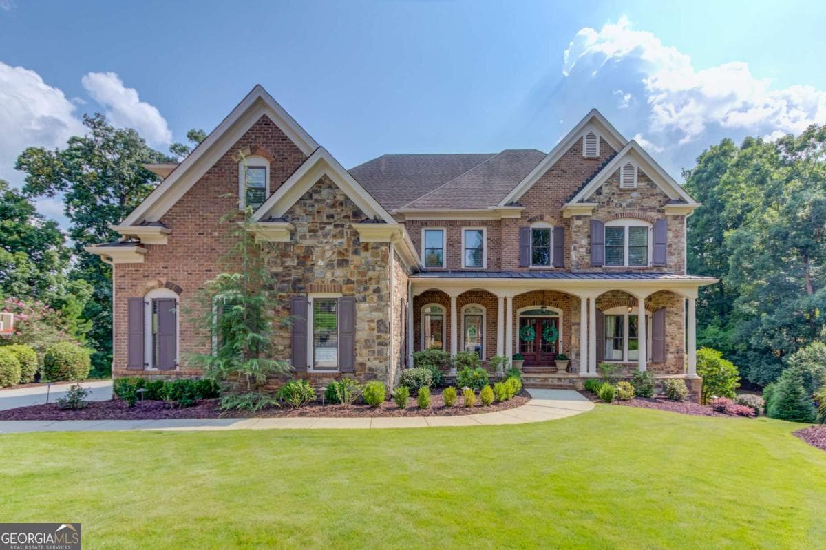 6 bedroom, 6.5 bathroom, 7,123 sq ft single family residence for sale at 5318 Binghurst Court, Suwanee, GA 30024 — photo 3