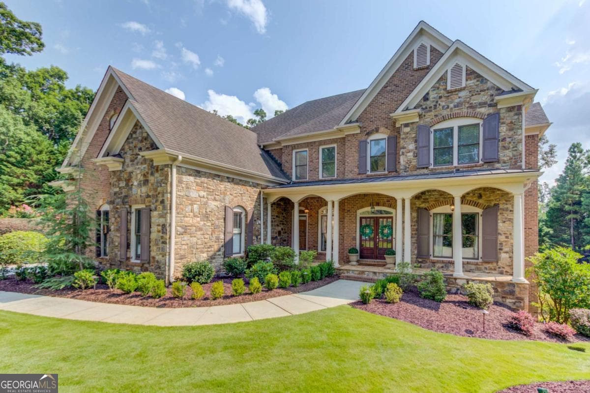 6 bedroom, 6.5 bathroom, 7,123 sq ft single family residence for sale at 5318 Binghurst Court, Suwanee, GA 30024 — photo 5