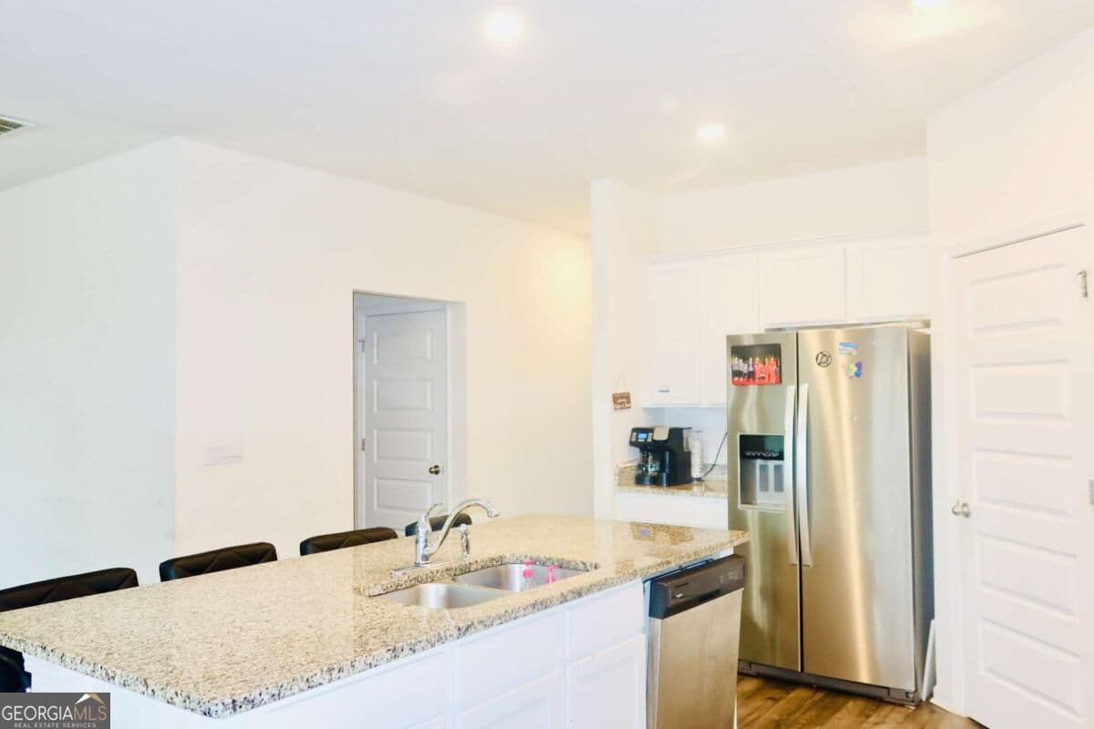 5 bedroom, 3.5 bathroom, 2,812 sq ft single family residence for sale at 1841 Vidalia Court, Dacula, GA 30019 — photo 6