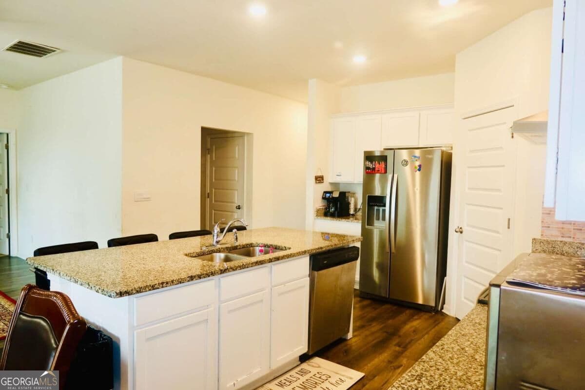 5 bedroom, 3.5 bathroom, 2,812 sq ft single family residence for sale at 1841 Vidalia Court, Dacula, GA 30019 — photo 5