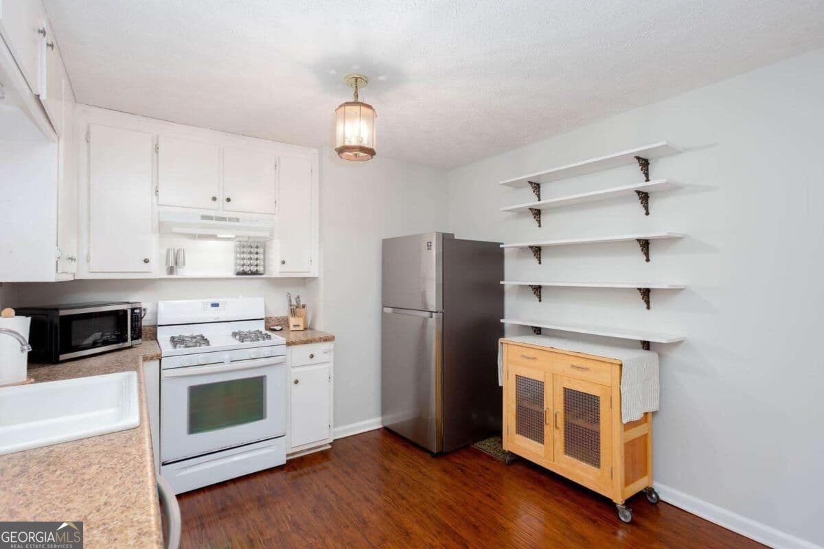 3 bedroom, 2 bathroom, 1,384 sq ft single family residence for sale at 2430 Trenton Drive, Canton, GA 30115 — photo 9
