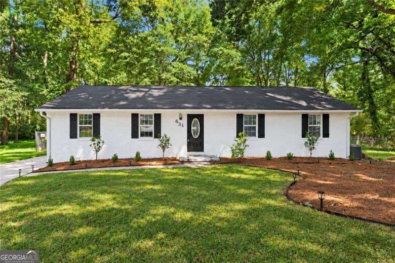 4 bedroom, 3 bathroom, 1,400 sq ft single family residence for sale at 631 Pasadena Court, Forest Park, GA 30297 — photo 2