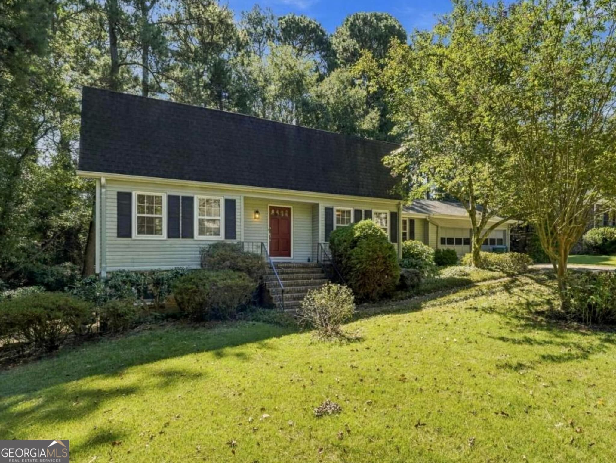 4 bedroom, 3 bathroom, 2,314 sq ft single family residence for sale at 4694 Marc Court, Lilburn, GA 30047 — photo 2