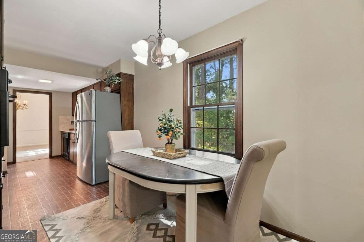4 bedroom, 3 bathroom, 2,314 sq ft single family residence for sale at 4694 Marc Court, Lilburn, GA 30047 — photo 3