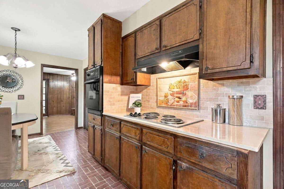4 bedroom, 3 bathroom, 2,314 sq ft single family residence for sale at 4694 Marc Court, Lilburn, GA 30047 — photo 5