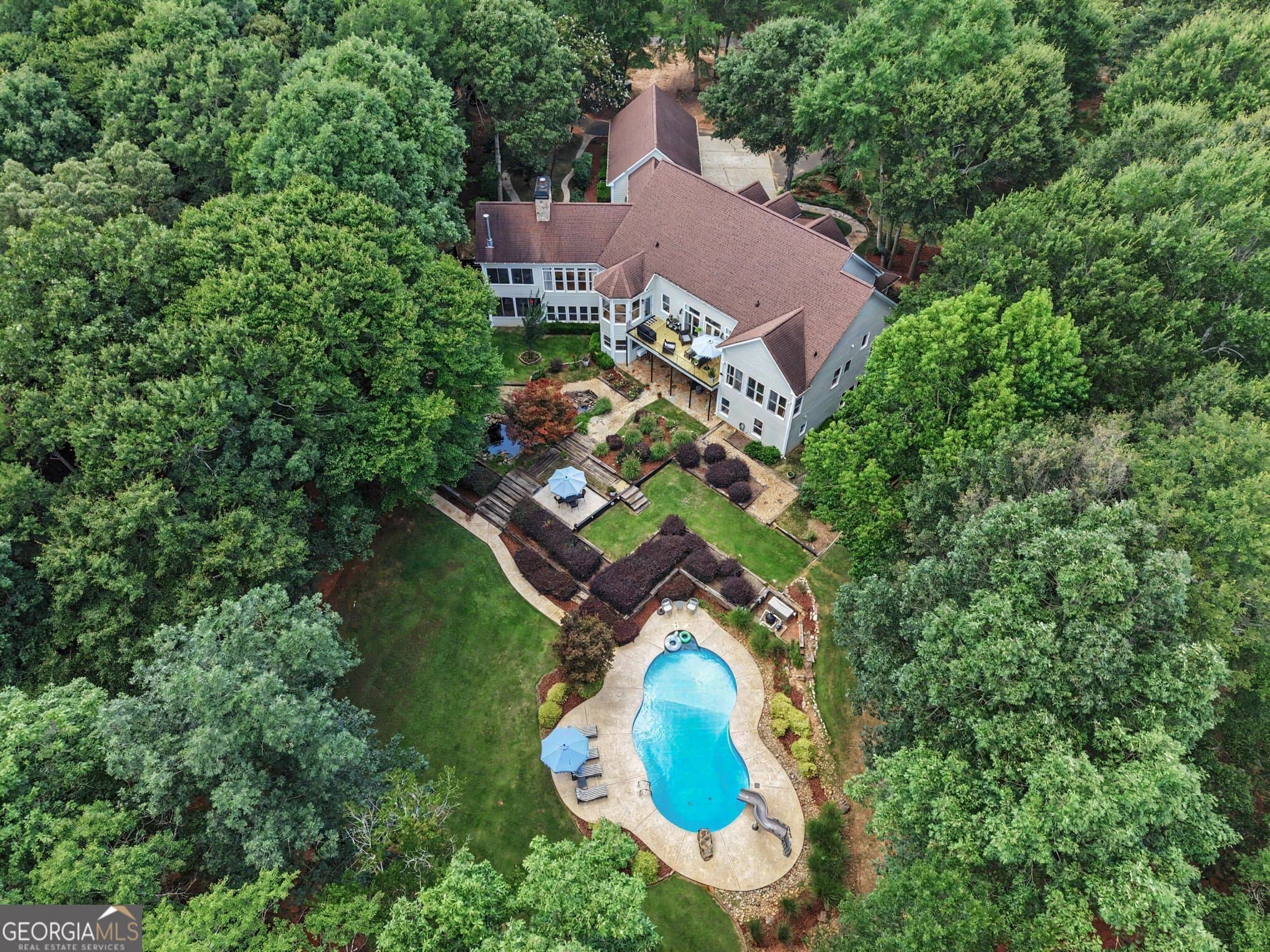 4 bedroom, 4 bathroom, 7,016 sq ft single family residence for sale at 1790 Lipscomb Lake Road, Pendergrass, GA 30567 — photo 2