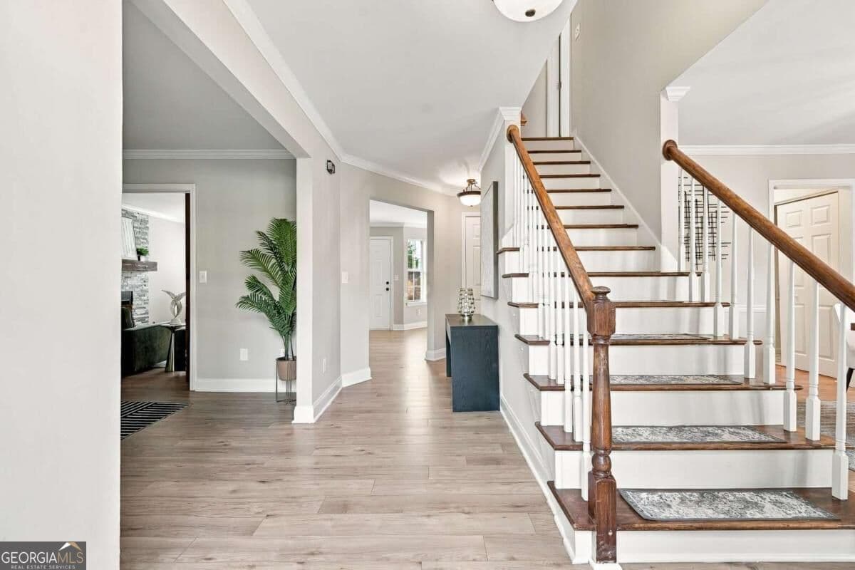 4 bedroom, 2.5 bathroom, 2,746 sq ft single family residence for sale at 690 Ruxbury Court, Suwanee, GA 30024 — photo 3