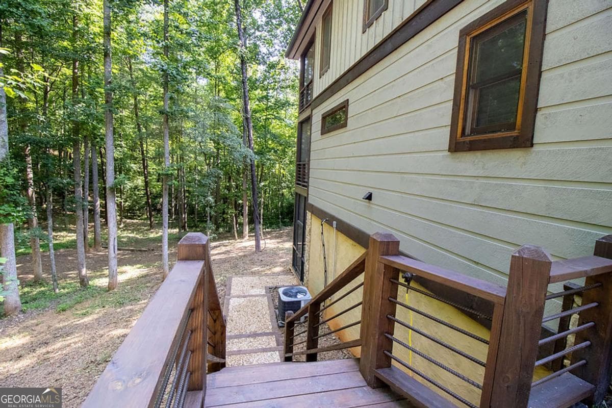 3 bedroom, 3 bathroom, 2,820 sq ft cabin,single family residence for sale at 142 Timber Ridge Road, Blue Ridge, GA 30513 — photo 7