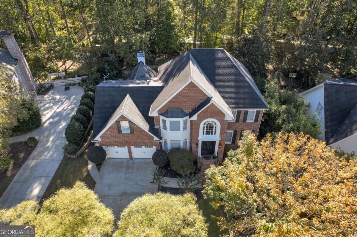 6 bedroom, 4.5 bathroom, 4,940 sq ft single family residence for sale at 5296 Fern Park Court, Peachtree Corners, GA 30092 — photo 2