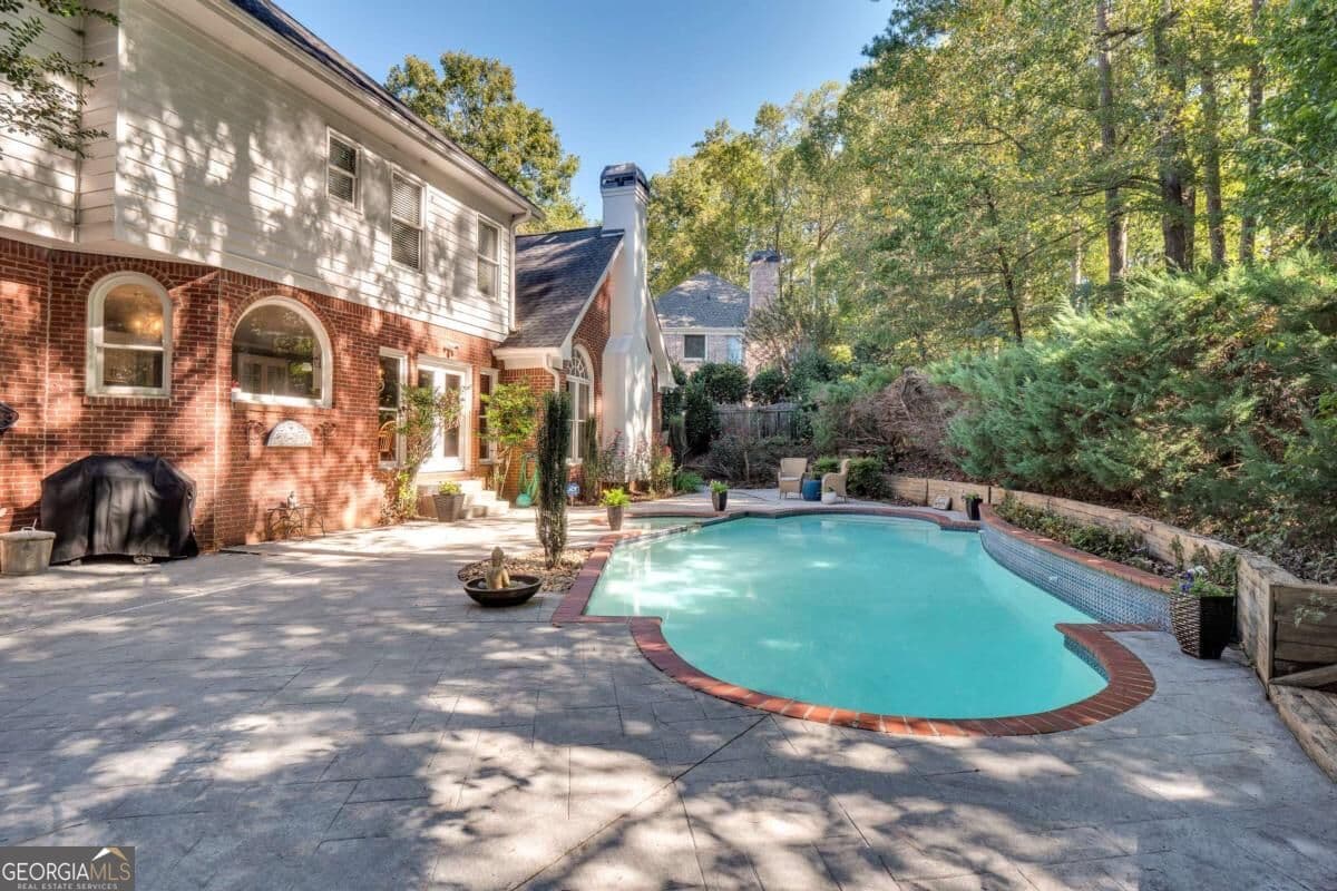 6 bedroom, 4.5 bathroom, 4,940 sq ft single family residence for sale at 5296 Fern Park Court, Peachtree Corners, GA 30092 — photo 6