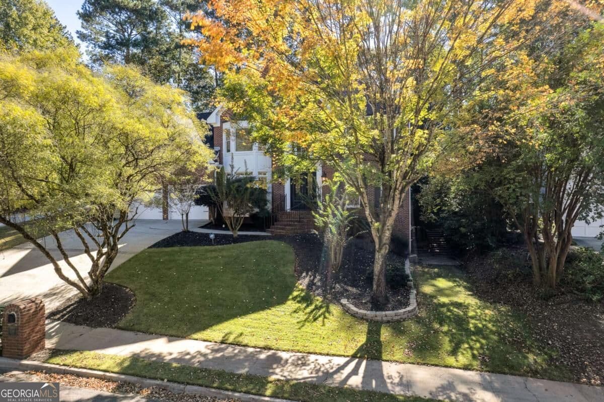6 bedroom, 4.5 bathroom, 4,940 sq ft single family residence for sale at 5296 Fern Park Court, Peachtree Corners, GA 30092 — photo 3
