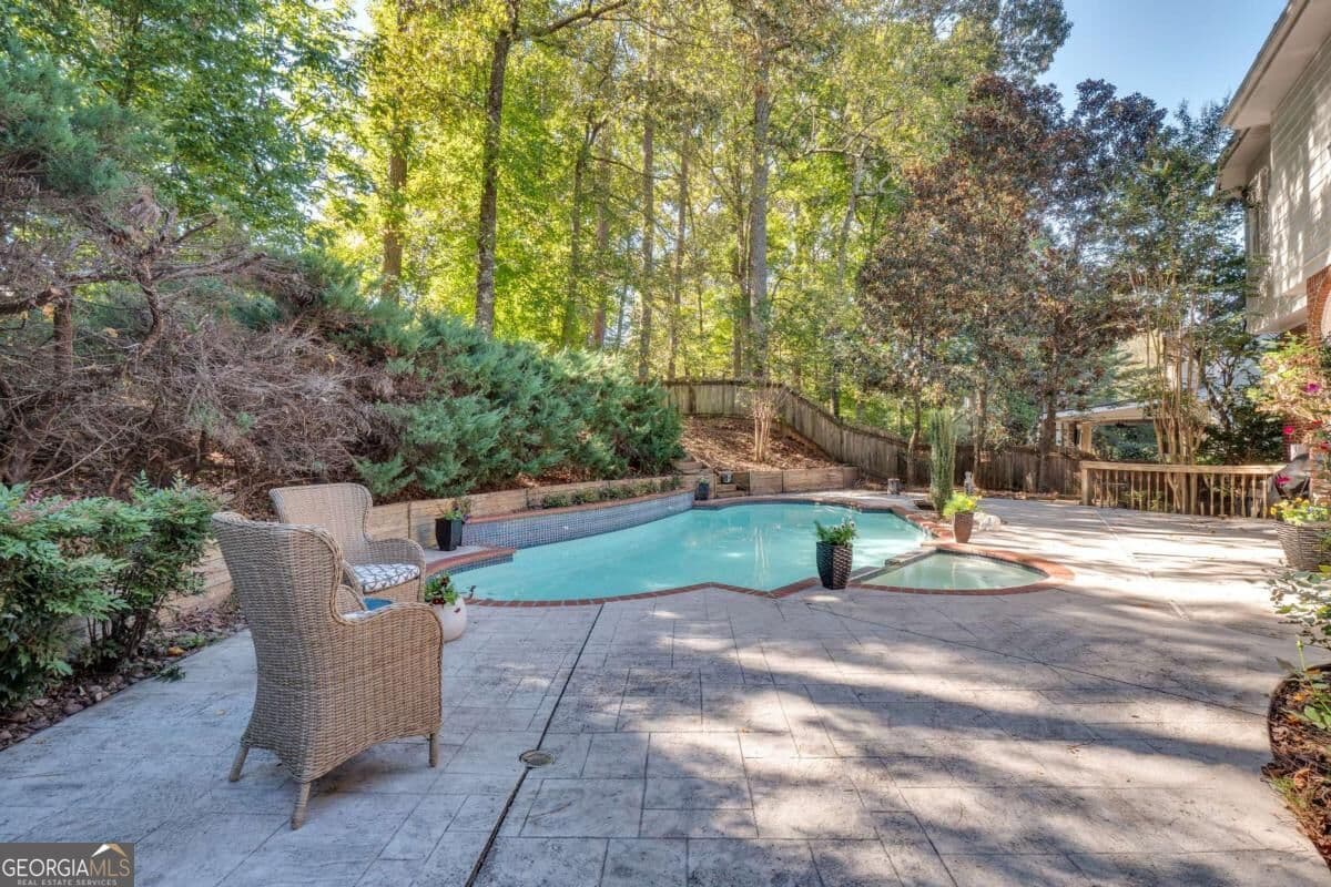 6 bedroom, 4.5 bathroom, 4,940 sq ft single family residence for sale at 5296 Fern Park Court, Peachtree Corners, GA 30092 — photo 5