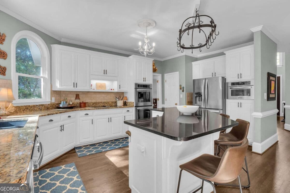 6 bedroom, 4.5 bathroom, 4,940 sq ft single family residence for sale at 5296 Fern Park Court, Peachtree Corners, GA 30092 — photo 9
