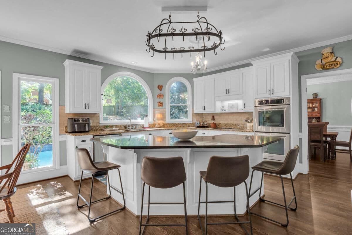 6 bedroom, 4.5 bathroom, 4,940 sq ft single family residence for sale at 5296 Fern Park Court, Peachtree Corners, GA 30092 — photo 8