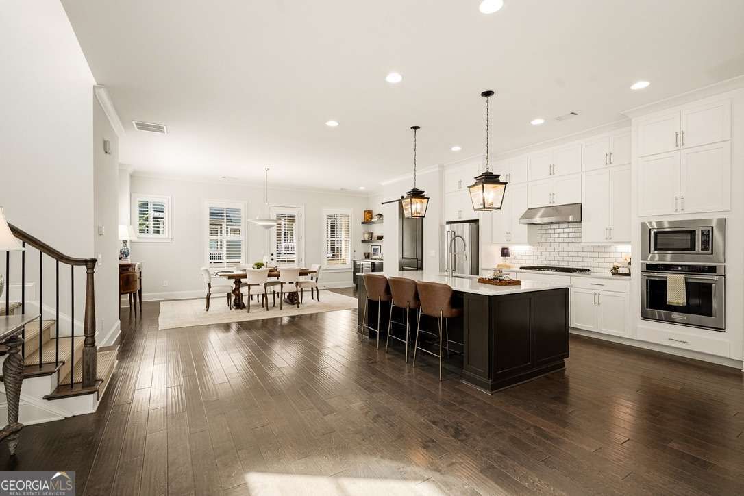 4 bedroom, 3.5 bathroom, 3,089 sq ft townhouse for sale at 137 QUINN Way, Milton, GA 30004 — photo 7