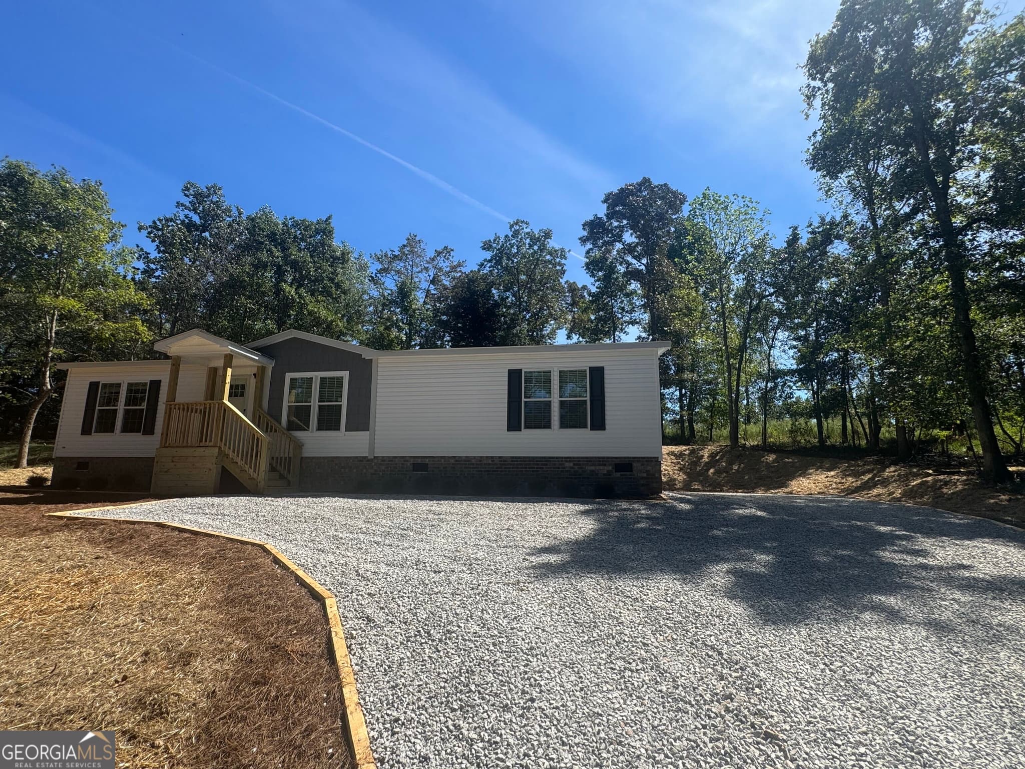 3 bedroom, 2 bathroom, 1,456 sq ft manufactured home,single family residence for sale at 1064 Garner Road, Cornelia, GA 30531 — photo 3