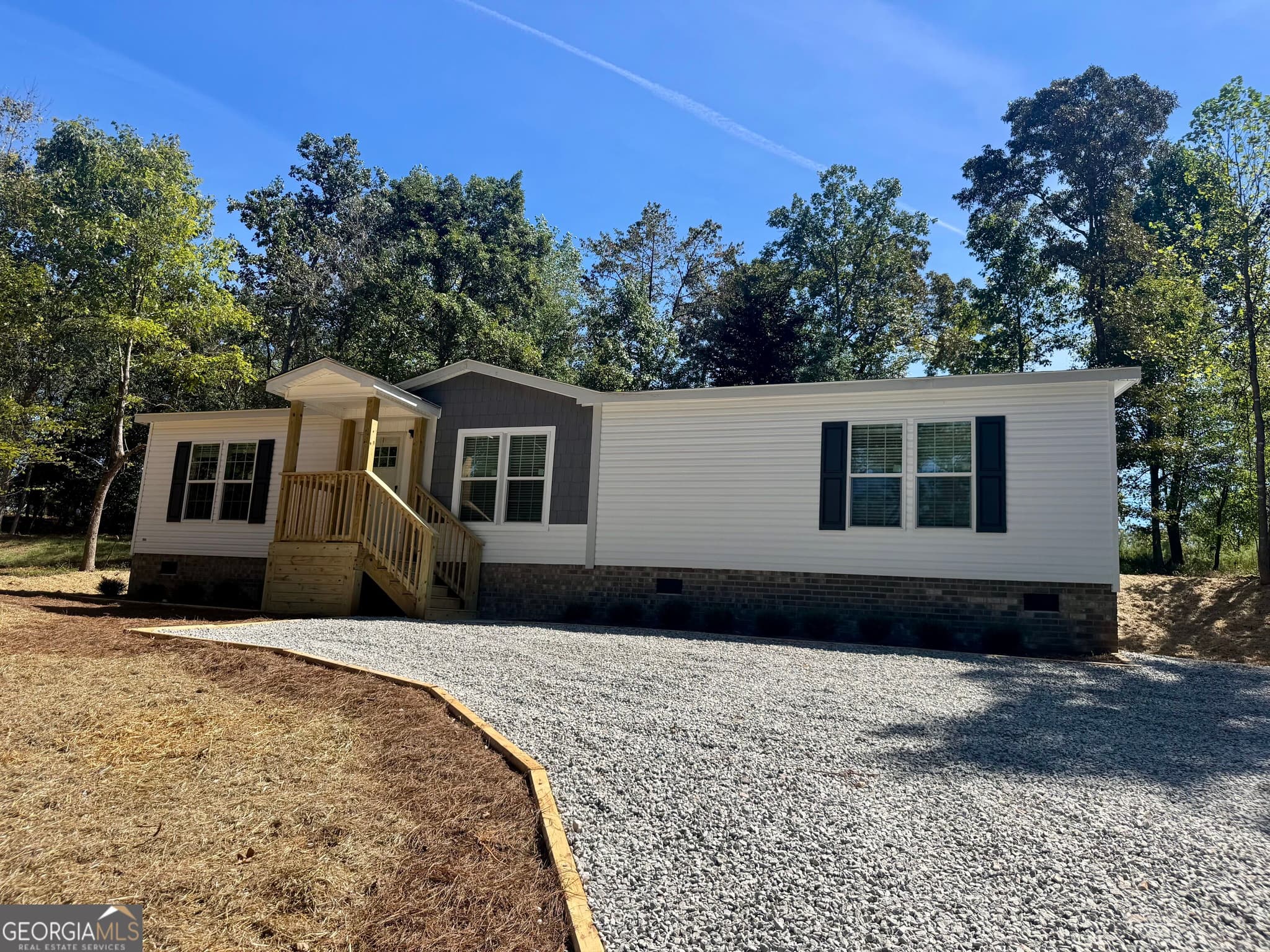 3 bedroom, 2 bathroom, 1,456 sq ft manufactured home,single family residence for sale at 1064 Garner Road, Cornelia, GA 30531