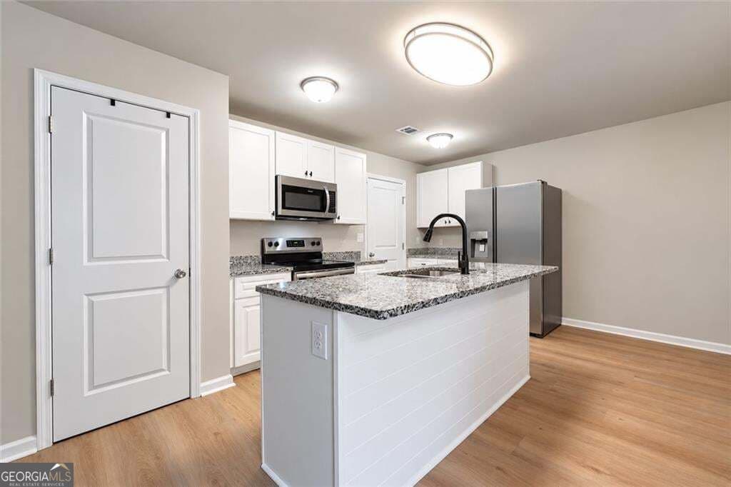 4 bedroom, 2.5 bathroom, 1,850 sq ft single family residence for sale at 480 McGiboney Lane, Covington, GA 30016 — photo 5
