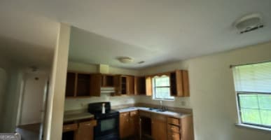 2 bedroom, 1 bathroom, 1,080 sq ft single family residence for sale at 1049 S Plum Street, Coolidge, GA 31738 — photo 2