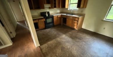 2 bedroom, 1 bathroom, 1,080 sq ft single family residence for sale at 1049 S Plum Street, Coolidge, GA 31738 — photo 3