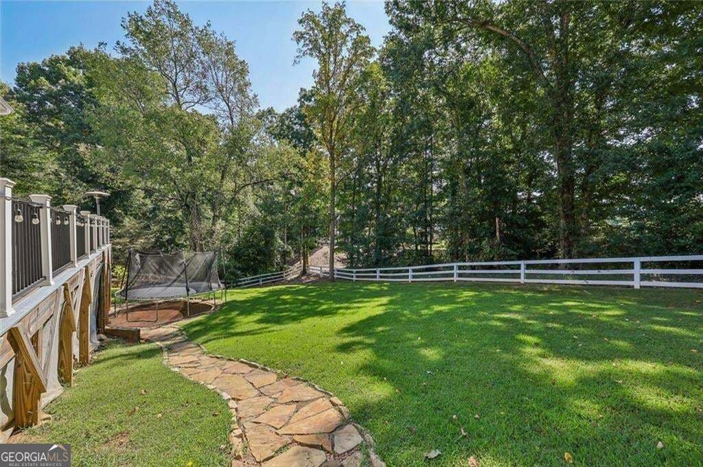 5 bedroom, 3.5 bathroom, 4,107 sq ft single family residence for sale at 2835 Live Oak Court, Cumming, GA 30041 — photo 3