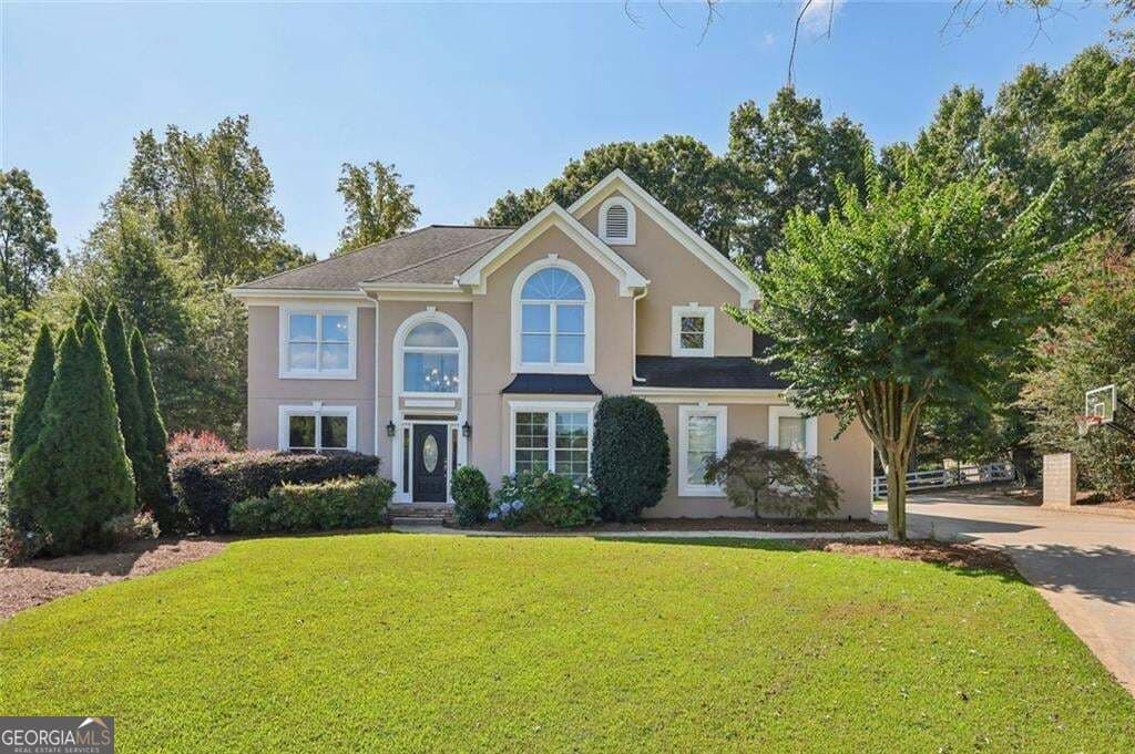 5 bedroom, 3.5 bathroom, 4,107 sq ft single family residence for sale at 2835 Live Oak Court, Cumming, GA 30041