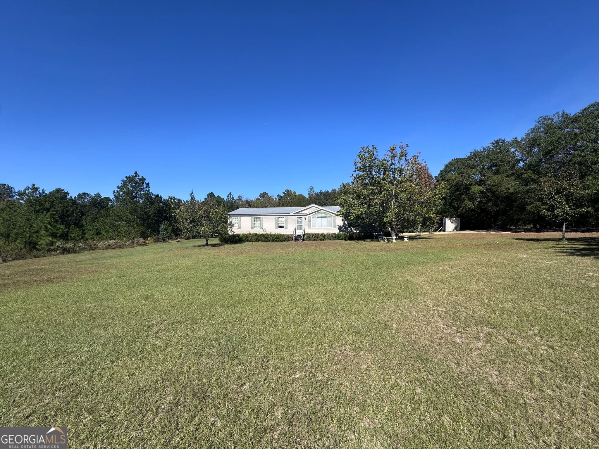 3 bedroom, 2 bathroom, 1,680 sq ft manufactured home,single family residence for sale at 1160 Pleasant Springs Church Road, East Dublin, GA 31027 — photo 6