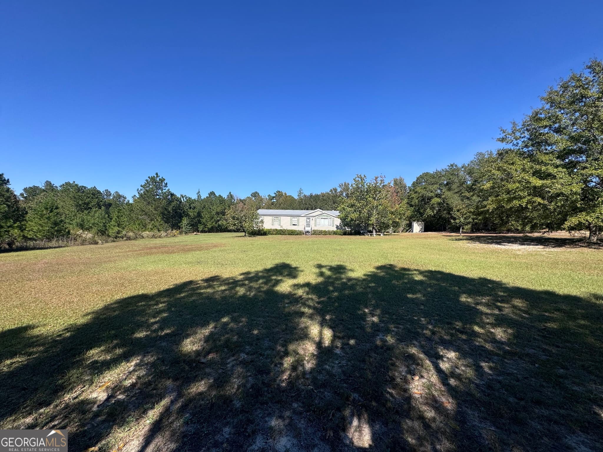 3 bedroom, 2 bathroom, 1,680 sq ft manufactured home,single family residence for sale at 1160 Pleasant Springs Church Road, East Dublin, GA 31027 — photo 7