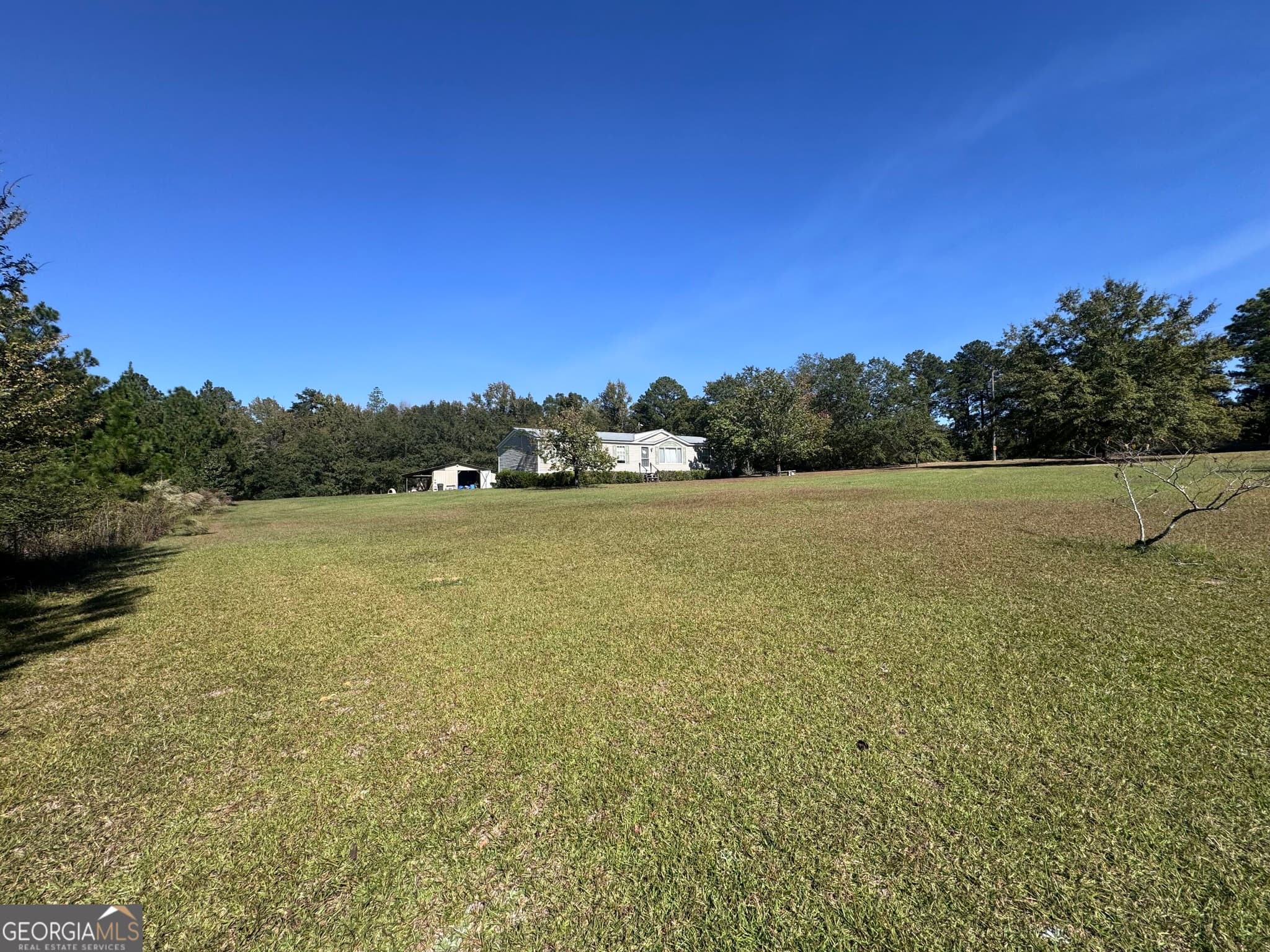 3 bedroom, 2 bathroom, 1,680 sq ft manufactured home,single family residence for sale at 1160 Pleasant Springs Church Road, East Dublin, GA 31027 — photo 9