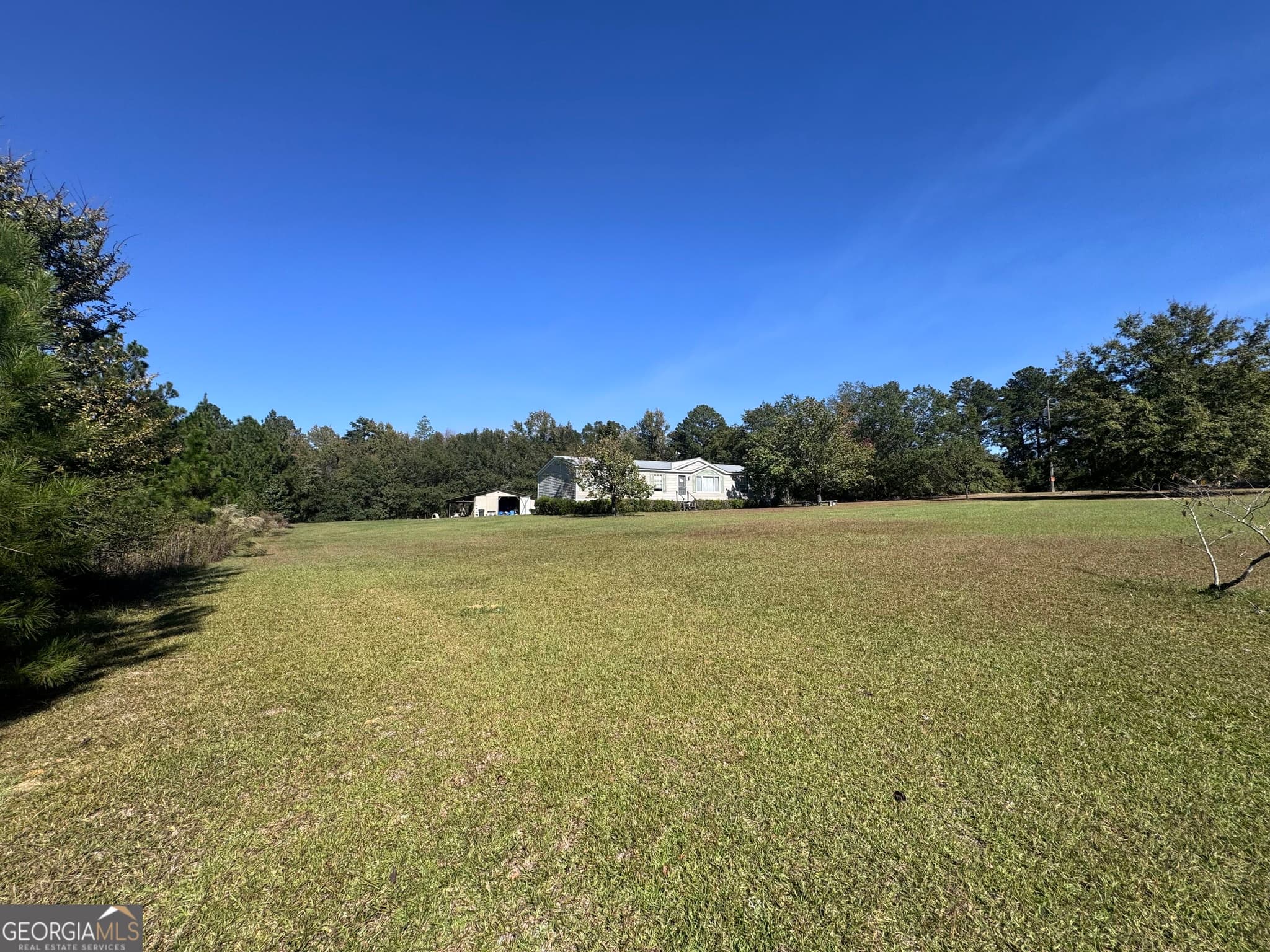 3 bedroom, 2 bathroom, 1,680 sq ft manufactured home,single family residence for sale at 1160 Pleasant Springs Church Road, East Dublin, GA 31027 — photo 8