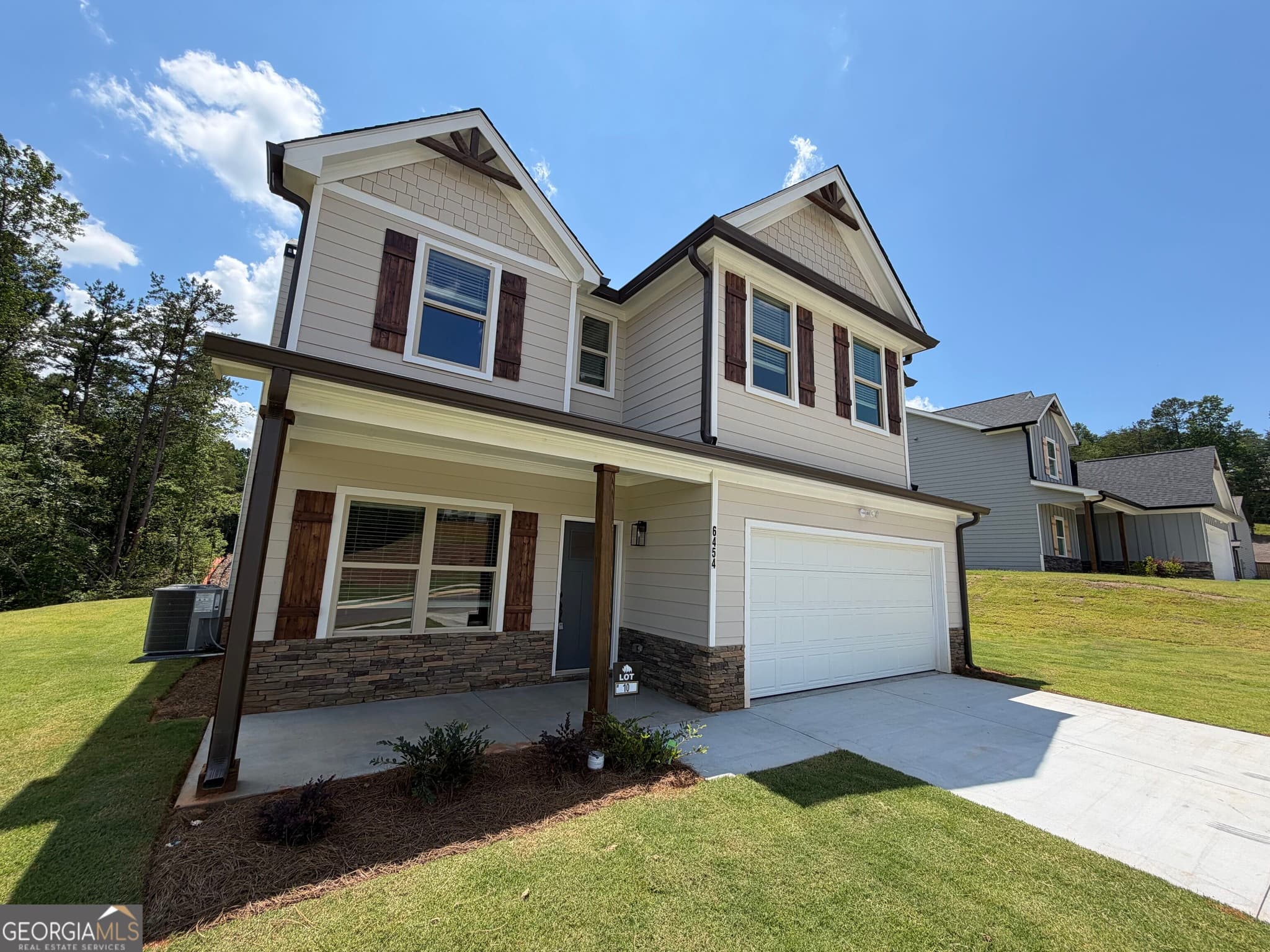 4 bedroom, 2.5 bathroom, 2,903 sq ft single family residence for sale at 6467 Plantation Station Drive, Lula, GA 30554 — photo 2