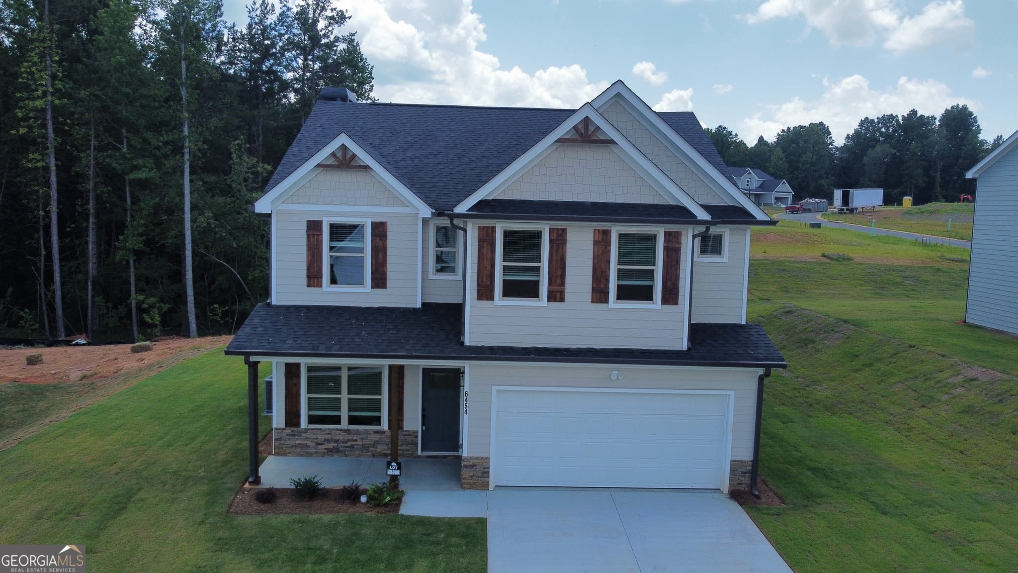 4 bedroom, 2.5 bathroom, 2,903 sq ft single family residence for sale at 6467 Plantation Station Drive, Lula, GA 30554 — photo 3