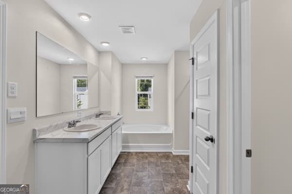 5 bedroom, 3 bathroom single family residence for sale at 3737 SE Chevington Court, Atlanta, GA 30354 — photo 4