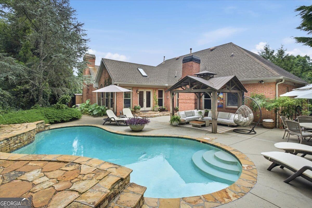 4 bedroom, 3.5 bathroom, 4,413 sq ft single family residence for sale at 4900 Walnut Grove, Johns Creek, GA 30022 — photo 2