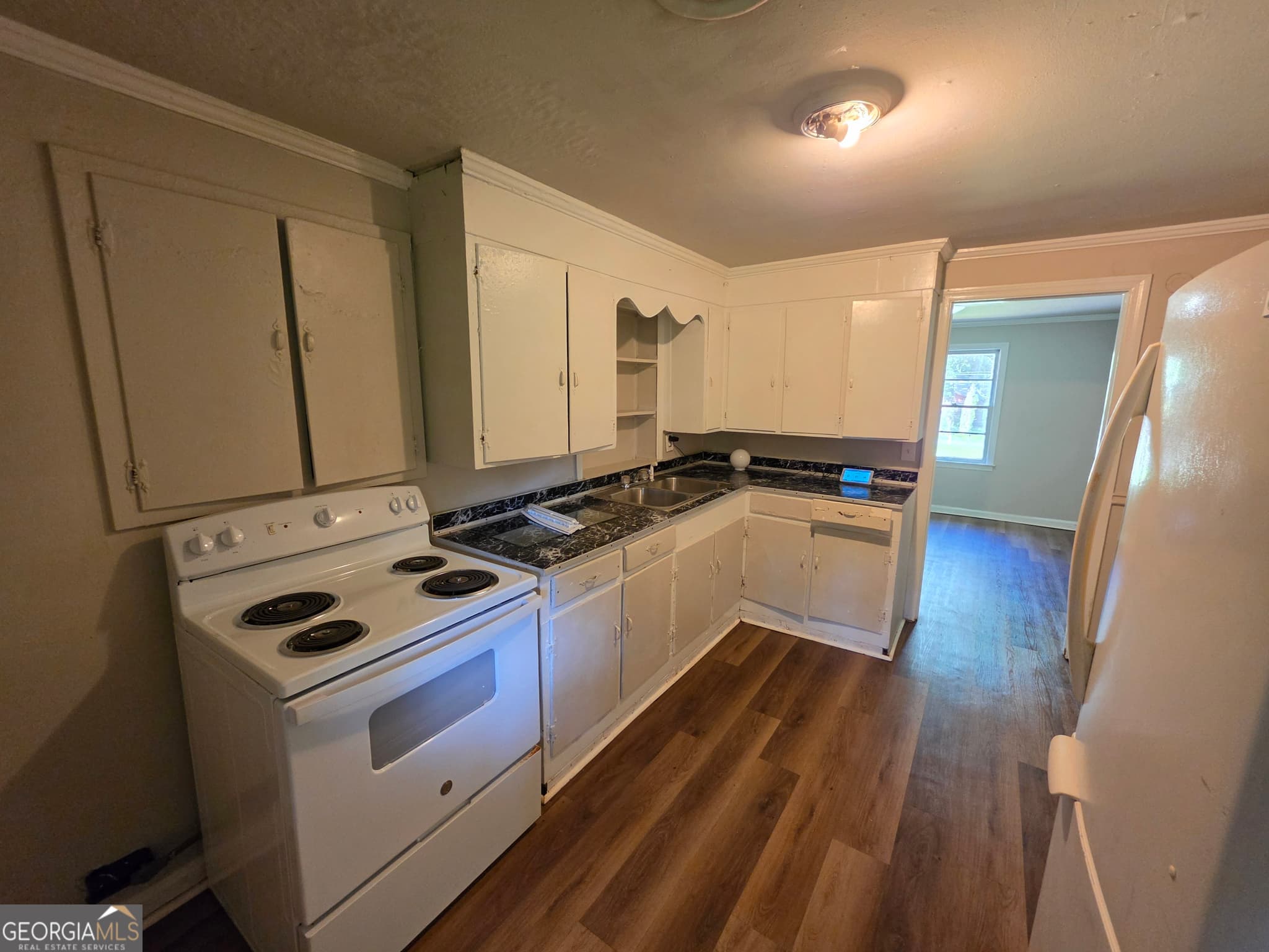 4 bedroom, 2 bathroom, 1,324 sq ft single family residence for sale at 2741 Coral Way, Macon, GA 31211 — photo 5