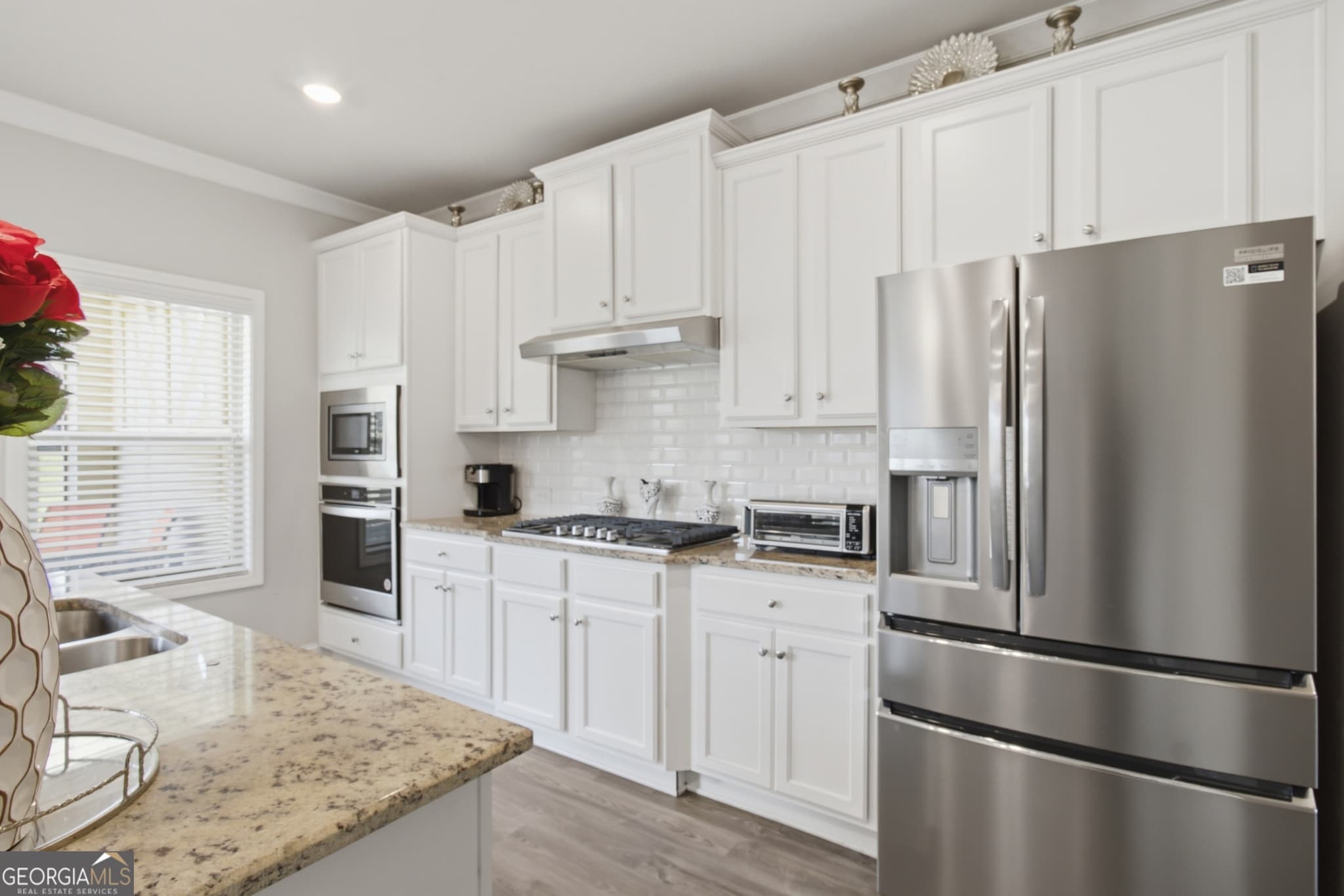 4 bedroom, 2.5 bathroom, 2,526 sq ft single family residence for sale at 114 Henson Farm Drive, Loganville, GA 30052 — photo 6