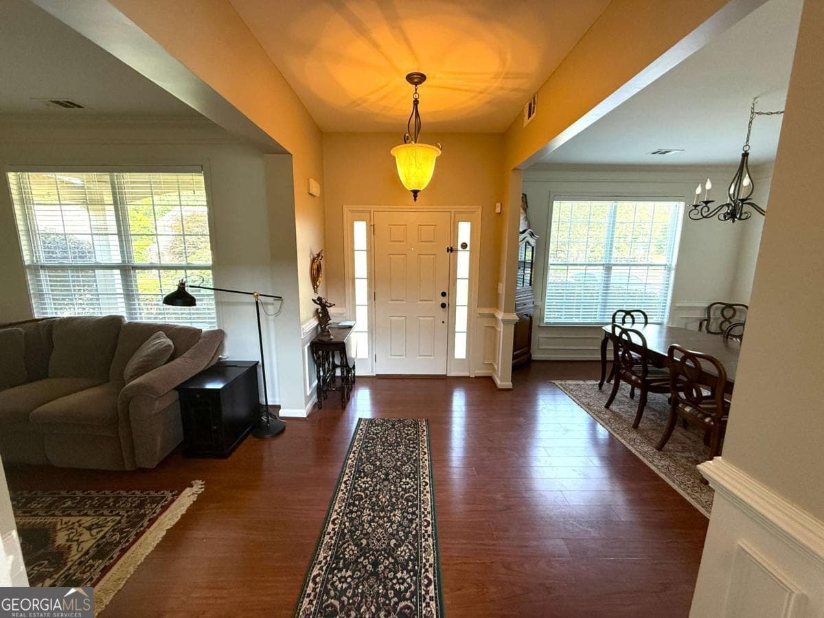 4 bedroom, 3 bathroom, 2,646 sq ft single family residence for sale at 6640 Grand Magnolia Drive, Buford, GA 30518 — photo 2