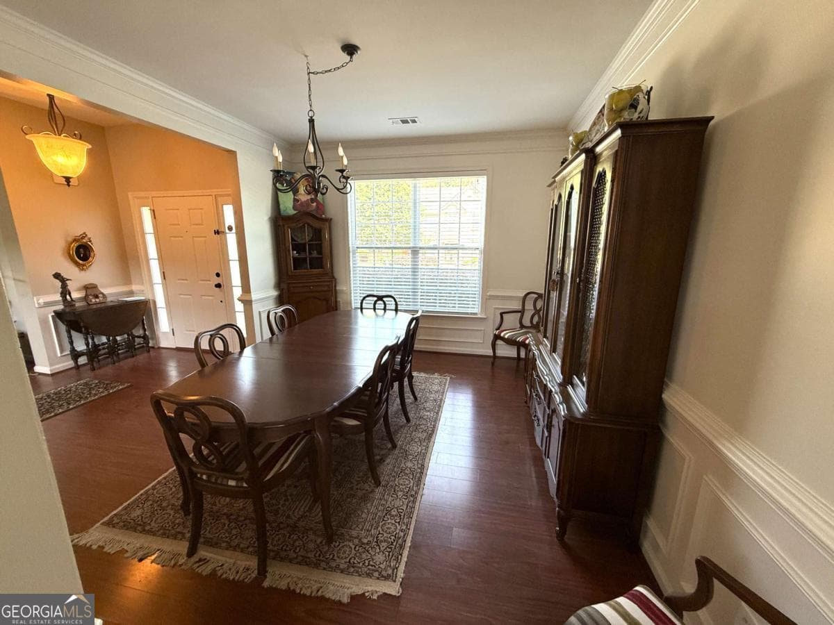 4 bedroom, 3 bathroom, 2,646 sq ft single family residence for sale at 6640 Grand Magnolia Drive, Buford, GA 30518 — photo 3