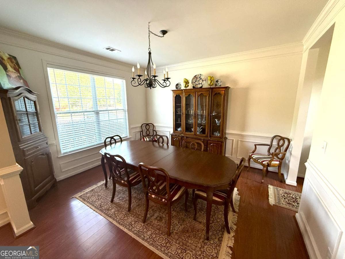 4 bedroom, 3 bathroom, 2,646 sq ft single family residence for sale at 6640 Grand Magnolia Drive, Buford, GA 30518 — photo 5